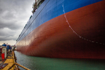 Poster - launching of renovated tanker kargo ship from dock to water.