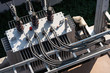 Top view of High voltage power transformer with electrical insulation and electrical equipment in power substation.