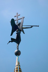 Wall Mural - Russia, Kazan June 2019. Weather vane with an angel in the Raif monastery. Christian culture, tourism and pilgrimage.