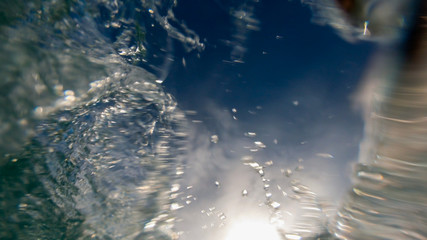 Wall Mural - Abstract  Natural underwater background. Water Splash in Blurred Motion