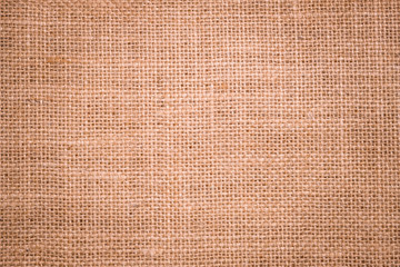 Wall Mural - Rough hessian background with flecks of varying colors of beige and brown. with copy space. office desk concept, Hessian sackcloth burlap woven texture background.