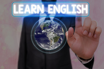 Poster - Writing note showing Learn English. Business concept for gain acquire knowledge in new language by study Elements of this image furnished by NASA