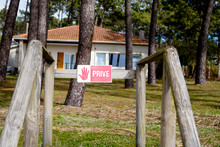 Privé Means In French Sign Private Property On A Wooden Gate