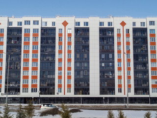 Modern apartment building. Apartment block. Residential building. Housing estate. New residential area. Ust-Kamenogorsk (Kazakhstan)