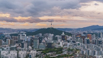 Wall Mural - Time lapse cloudy over Seoul city with Seoul Tower, Seoul city view from Inwangsan mountain, Seoul South Korea.