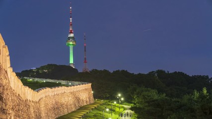 Wall Mural - Night time lapse of Seoul tower at Namsan mountain, Seoul South Korea.