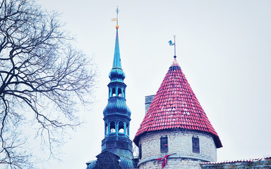 Wall Mural - Defensive walls and Spire of St Nicholas Church in Tallinn