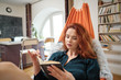 © ZoomTeam - The woman reads the book during the coronavirus quarantine