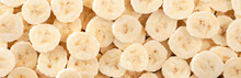 Banana Slices. Background And Texture. Panorama.