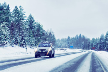 Wall Mural - Car in road in winter Rovaniemi Finland