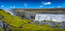 Panoramic View Over Biggest And Most Powerful Waterfall In Europe Called Dettifoss In Iceland, Near Lake Myvatn, At Blue Sky, Summer