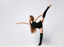 Flexible Skinny Girl Posing In Vertical Split