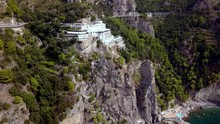 Grand Hotel Tritone In Positano Italy On The Amalfi Coastline, Aerial Pan Right Reveal Shot
