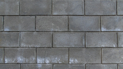 Wall of concrete bricks