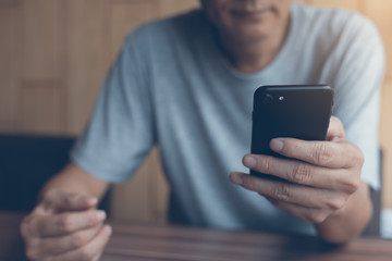 Wall Mural - Man using smartphone