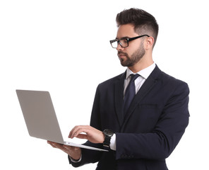 Sticker - Young businessman with laptop on white background