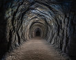Path through an abandoned railway tunnel, Otago, New Zealand