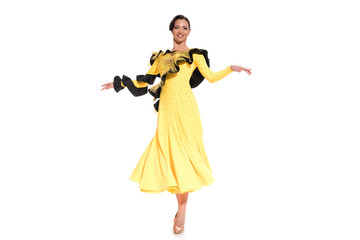 smiling elegant young ballroom dancer in yellow dress dancing isolated on white