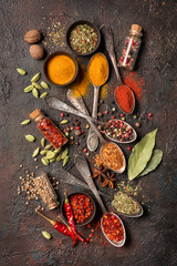 Wall Mural - Different spices, dry kitchen herbs and seeds for tasty meals