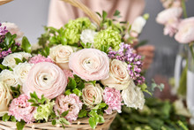 Spring Bouquet In A Wicker Basket.. Learning Flower Arranging, Making Beautiful Bouquets With Your Own Hands. Flowers Delivery