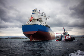Poster - launching of renovated tanker cargo ship from dock to water.