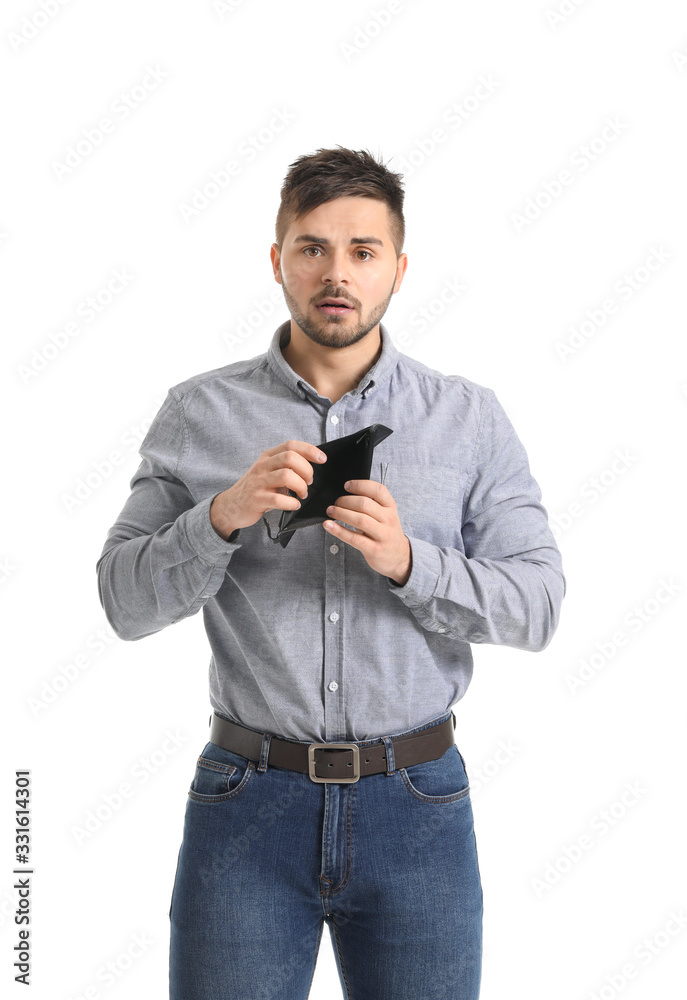 Sad man with empty purse on white background
