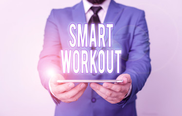 Poster - Word writing text Smart Workout. Business photo showcasing set a goal that maps out exactly what need to do in being fit Businessman in blue suite with a tie holds lap top in hands