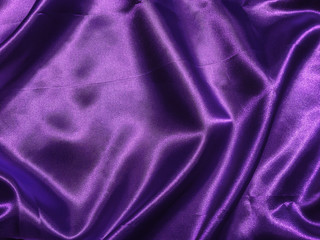 Abstract purple fabric texture background with copy space for design