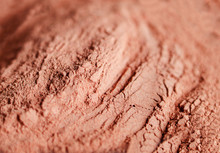 Red Bentonite Clay Powder. Natural Beauty Treatment And Spa Background. Clay Texture Close Up, Selective Focus.