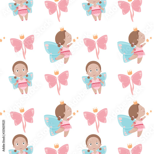 Little cute girl with butterfly wings and crown dancing and smiling