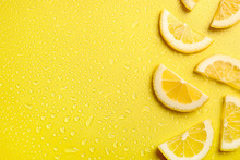 Lemon Slices On Yellow Background