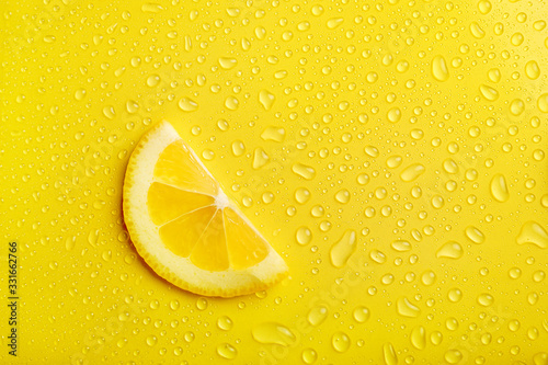 Lemon slice on yellow background Tableau sur Toile