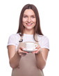 © LumenSt - Young woman in apron with cup isolated on white background