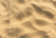 Textura De Arena De La Playa Marcada Por La Lluvia