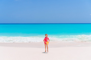 Wall Mural - Portrait of adorable little girl at beach during summer vacation