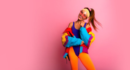 Back in time 90s 80s. Stylish girl in retro jacket and vintage aerobic body jump suit dancing, fashion trends, entertainment, heat in summer. Happy and positive. Horizontal, copy space.