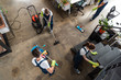 © LIGHTFIELD STUDIOS - top view of cleaning company team cleaning modern office