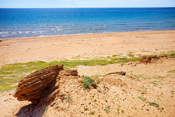 Canvas Print - Seascape at Korission lake with sandstones and dunes in the foreground in Corfu, Greece