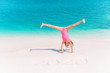 © travnikovstudio - Adorable active little girl at beach during summer vacation