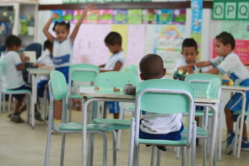 children in public school classroom