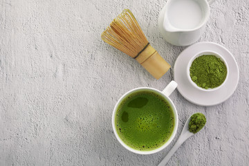 Wall Mural - Matcha powder. Organic green matcha tea ceremony. Healthy drink. Traditional japanese drink on white background