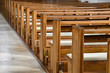 rows of empty pews in church