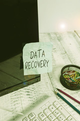 Fototapete - Writing note showing Data Recovery. Business concept for process of salvaging inaccessible lost or corrupted data Note paper taped to black computer screen near keyboard and stationary