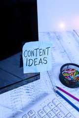 Fototapete - Writing note showing Content Ideas. Business concept for the formulated thought or opinion for content campaign Note paper taped to black computer screen near keyboard and stationary