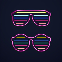 Bright Neon Glasses. Sunglasses Or Club Glasses With Light On Dark Background.