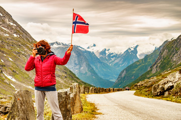 Poster - Tourist take picture in mountains Norway.