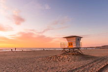 Lifeguard Tower On The Beach At Sunset