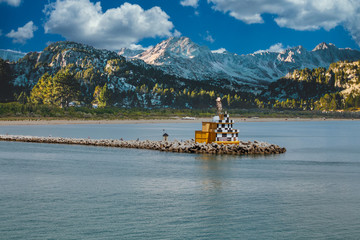 Sticker - Black and white beacon with Mountains in Background with snow