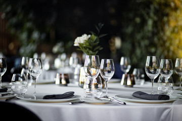 Beautiful table set for an event party or wedding reception . restaurant interior