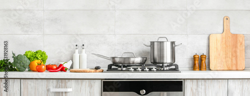 Fotomural Modern kitchen countertop with domestic culinary utensils on it, home healthy co